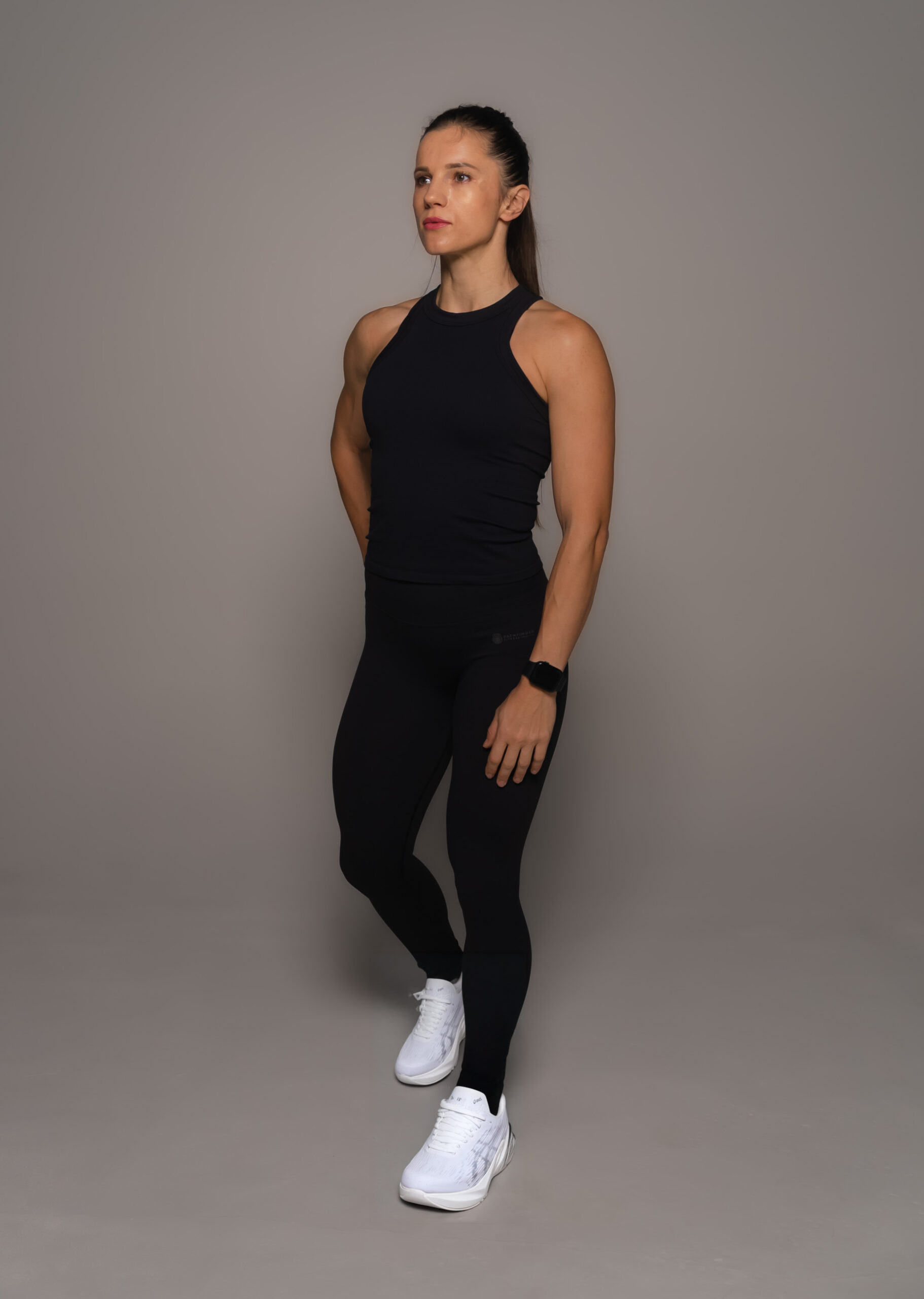 Woman wearing black leggings - Pathfinder Fitness (Endurane Leggings Black)