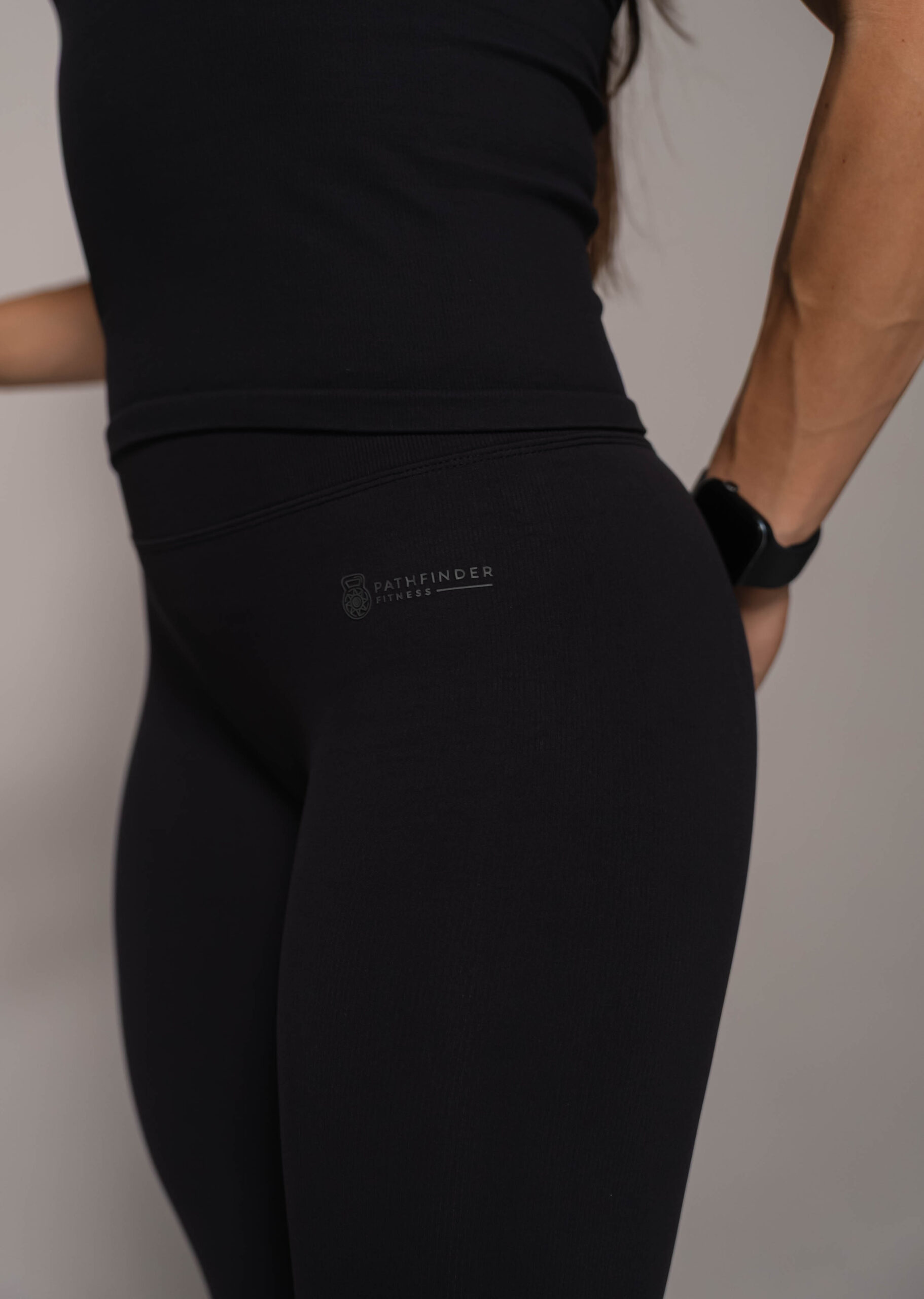 Woman wearing black leggings - Pathfinder Fitness