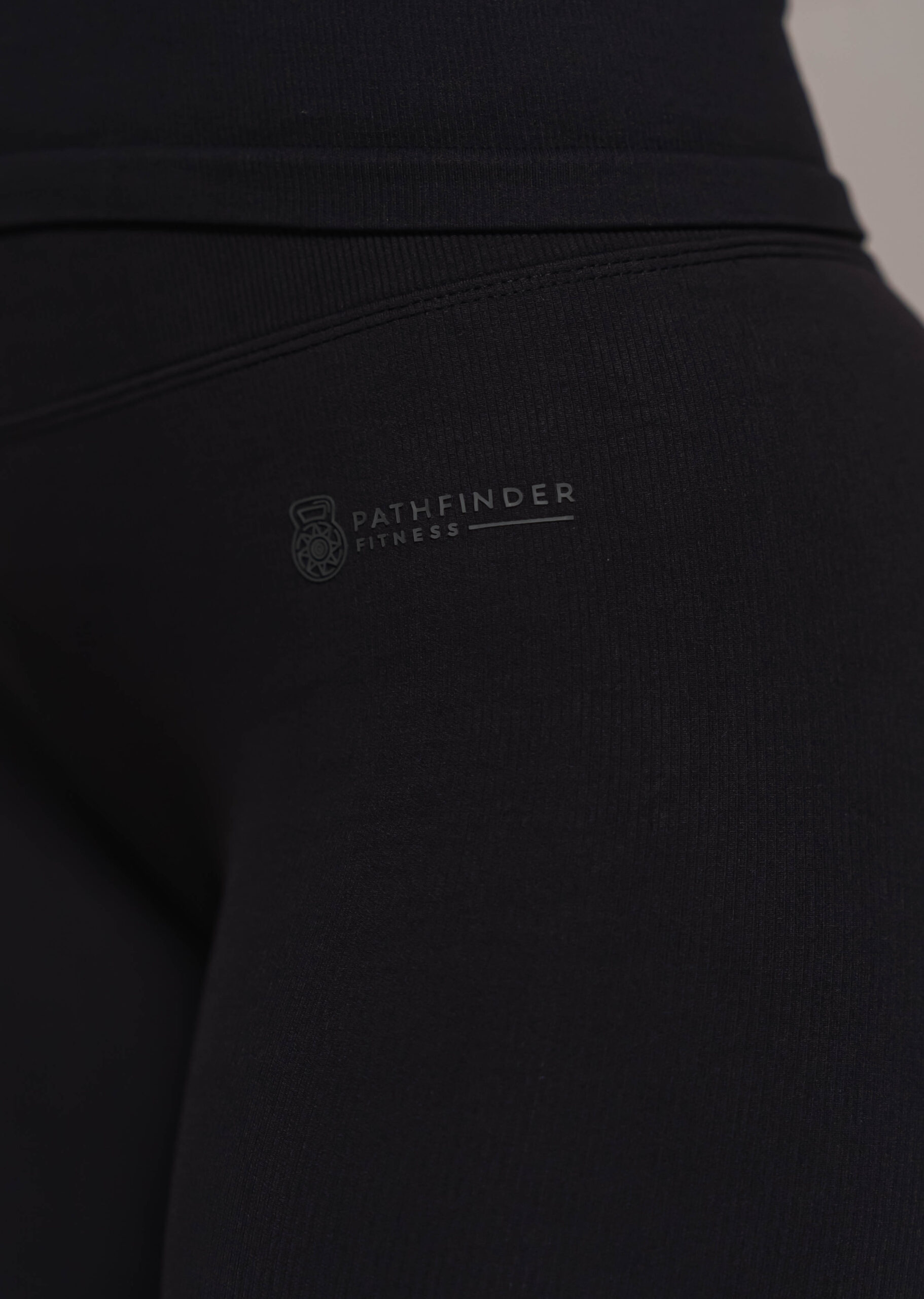 Woman wearing black leggings - Pathfinder Fitness