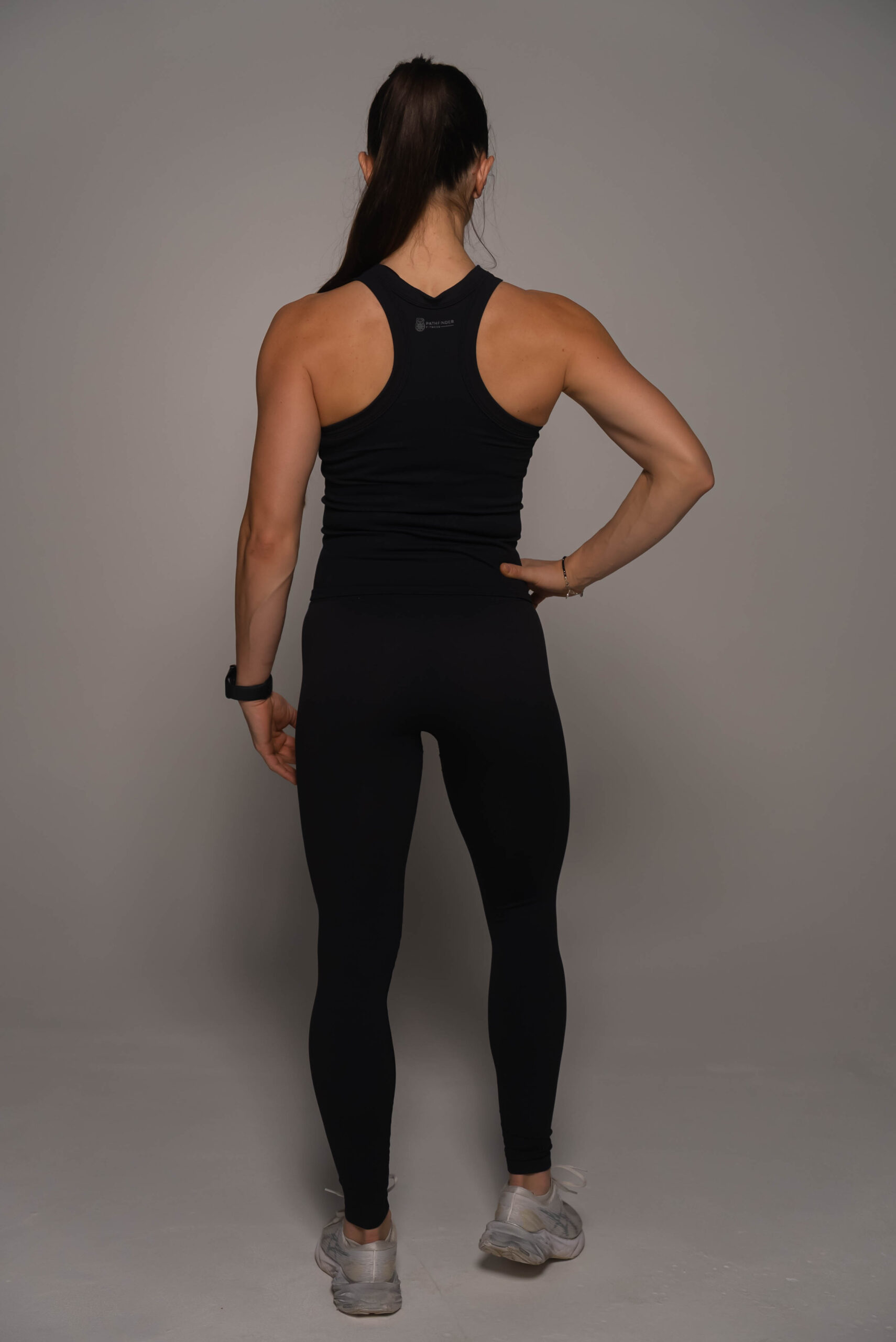 Woman wearing black leggings - Pathfinder Fitness