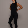 Women's wearing White Tank Top - Pathfinder Fitness (Elevate Tank Black)