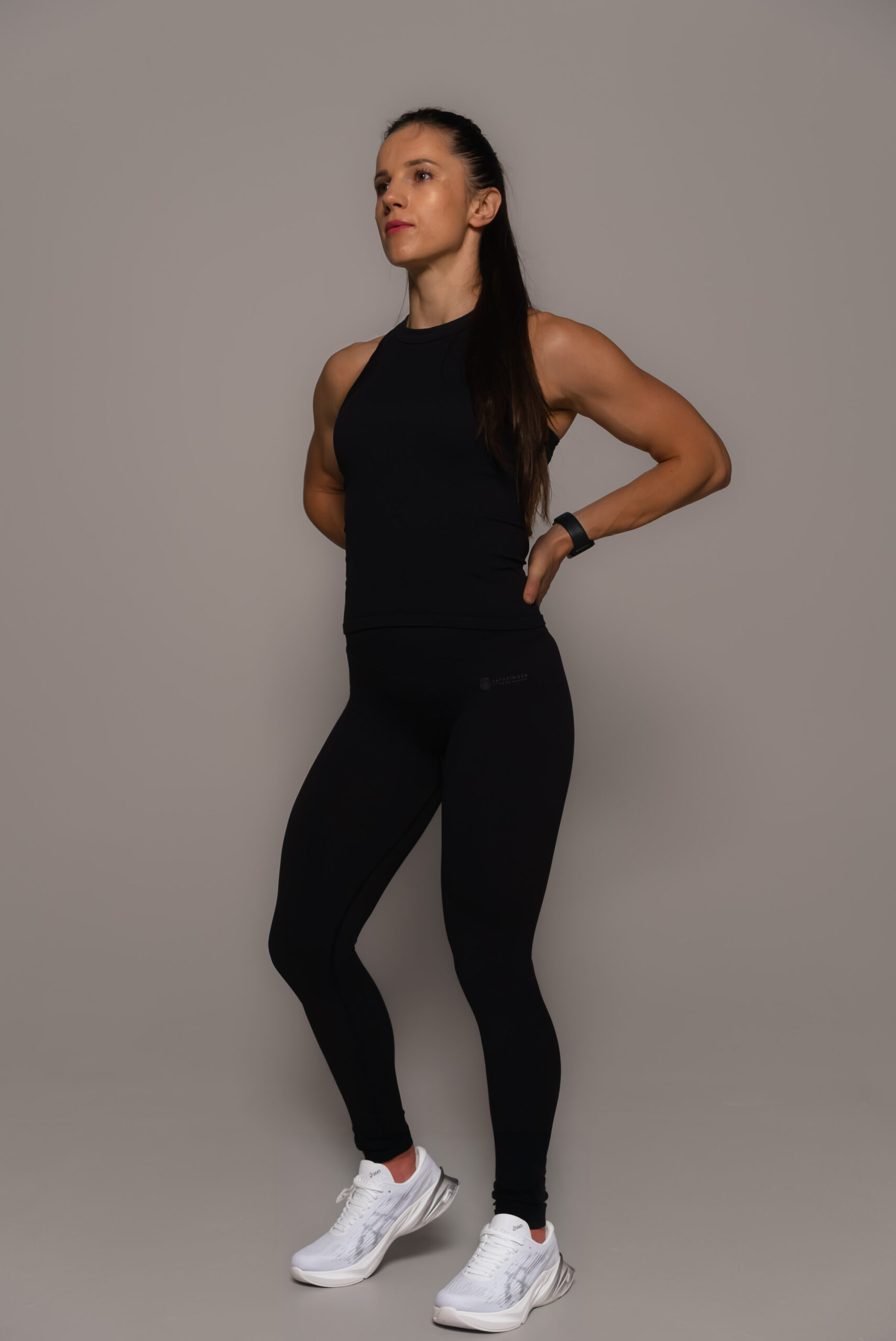 Women's wearing White Tank Top - Pathfinder Fitness (Elevate Tank Black)