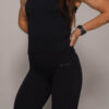 Women's wearing White Tank Top - Pathfinder Fitness