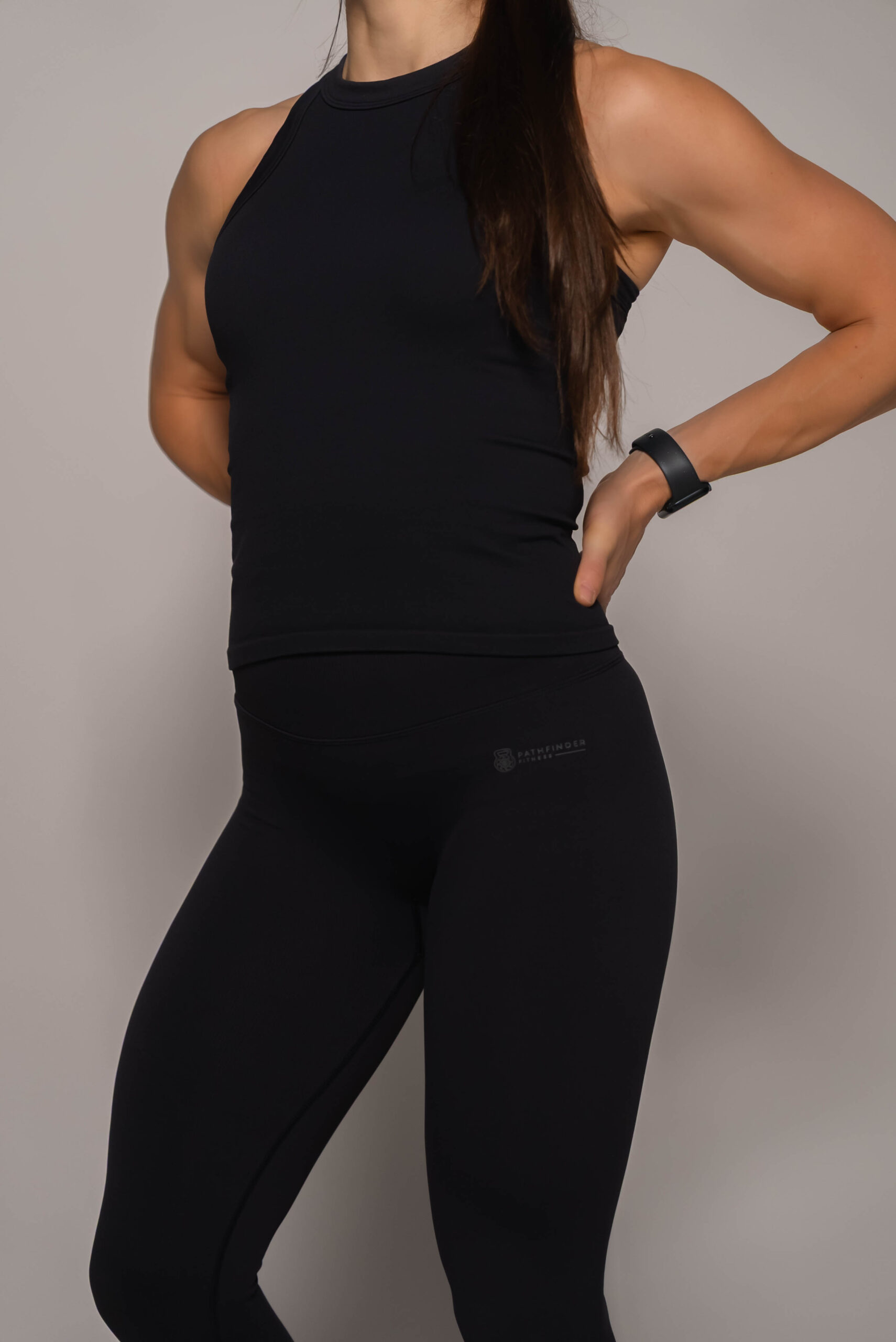 Women's wearing White Tank Top - Pathfinder Fitness