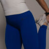 Women's wearing White Tank Top - Pathfinder Fitness