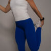 Women's wearing White Tank Top - Pathfinder Fitness