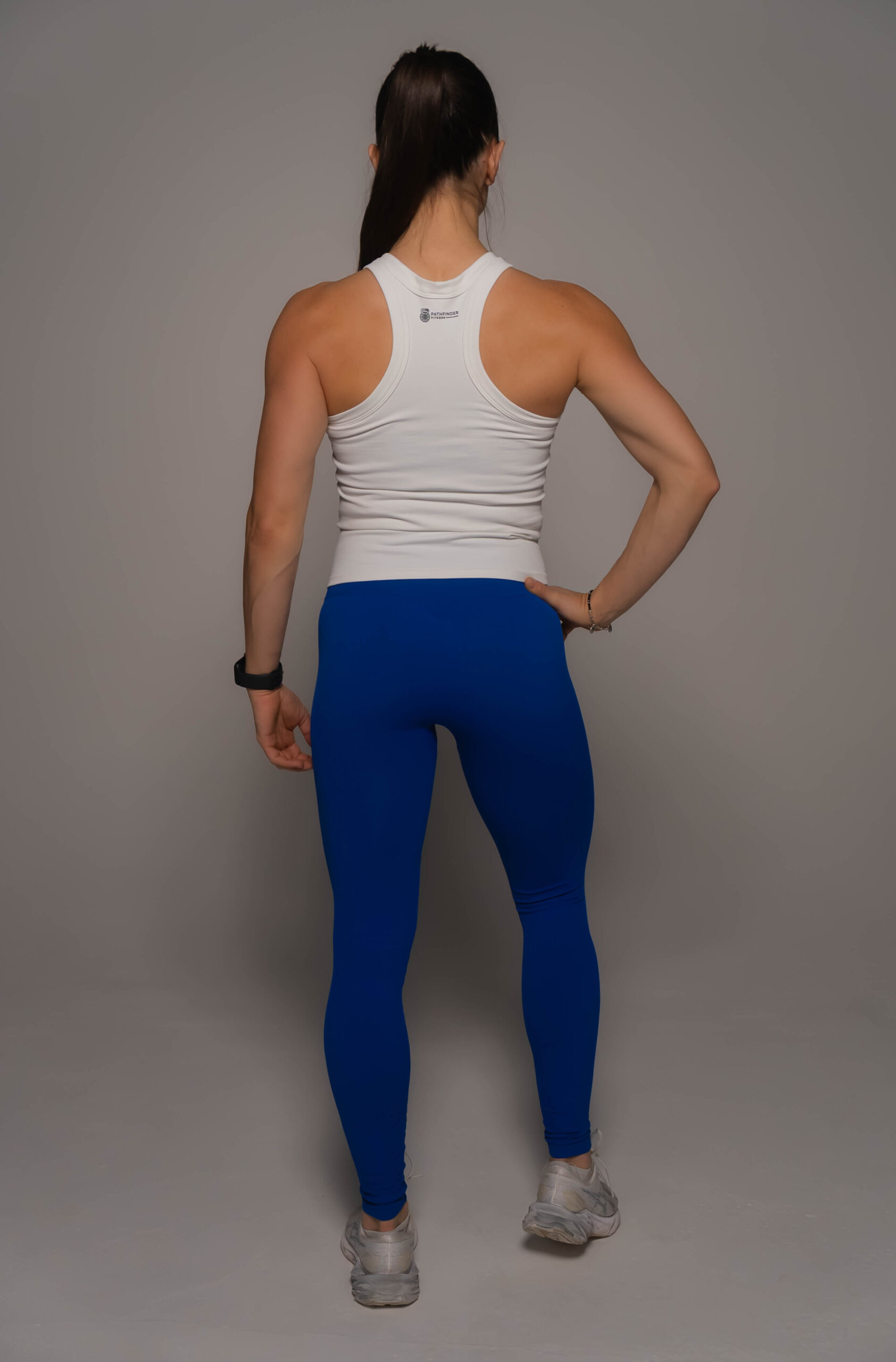 Women's wearing White Tank Top - Pathfinder Fitness