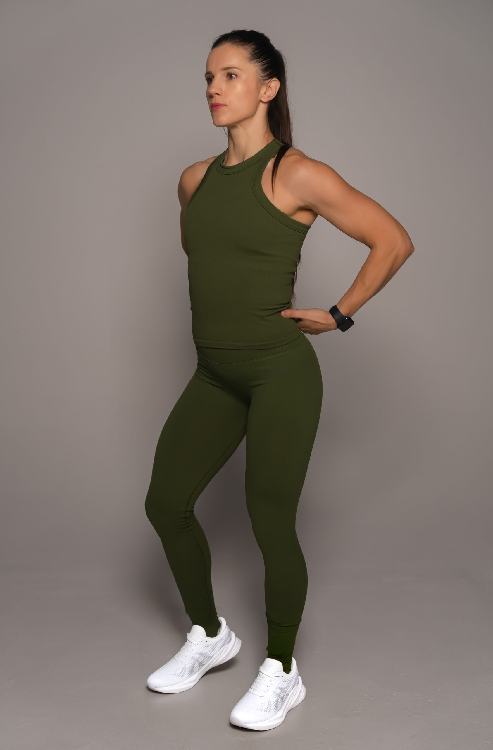 Women's wearing Army Green Tank Top - Pathfinder Fitness