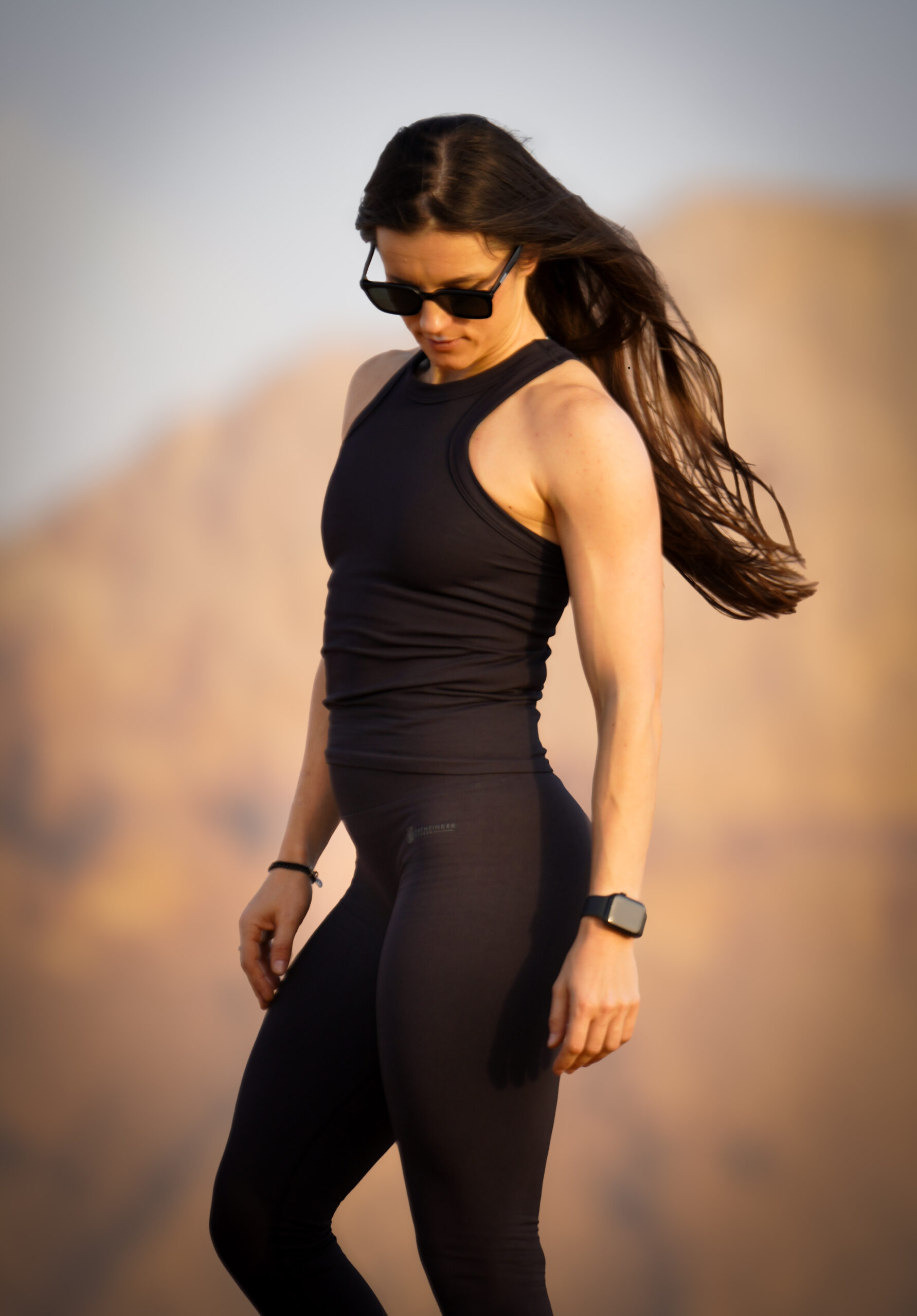 Woman wearing black leggings - Pathfinder Fitness