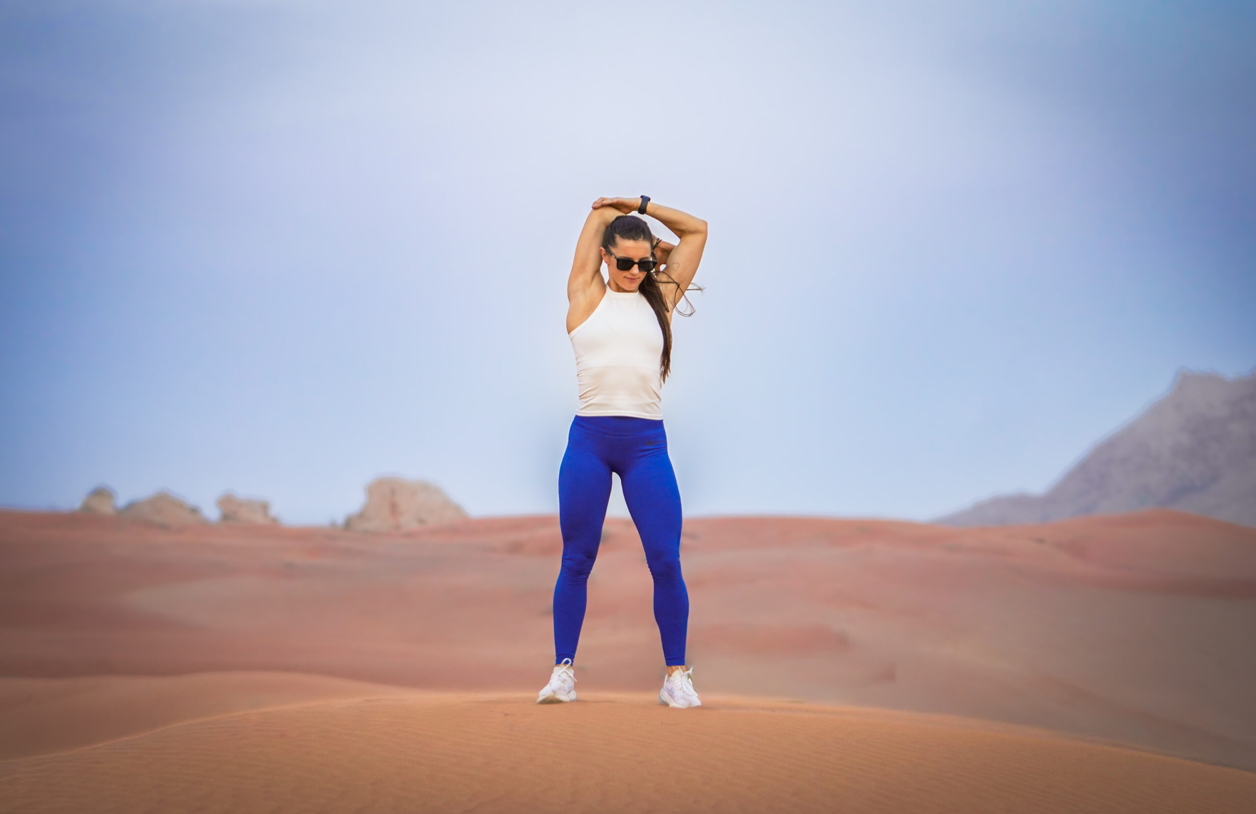 Women's wearing White Tank Top - Pathfinder Fitness