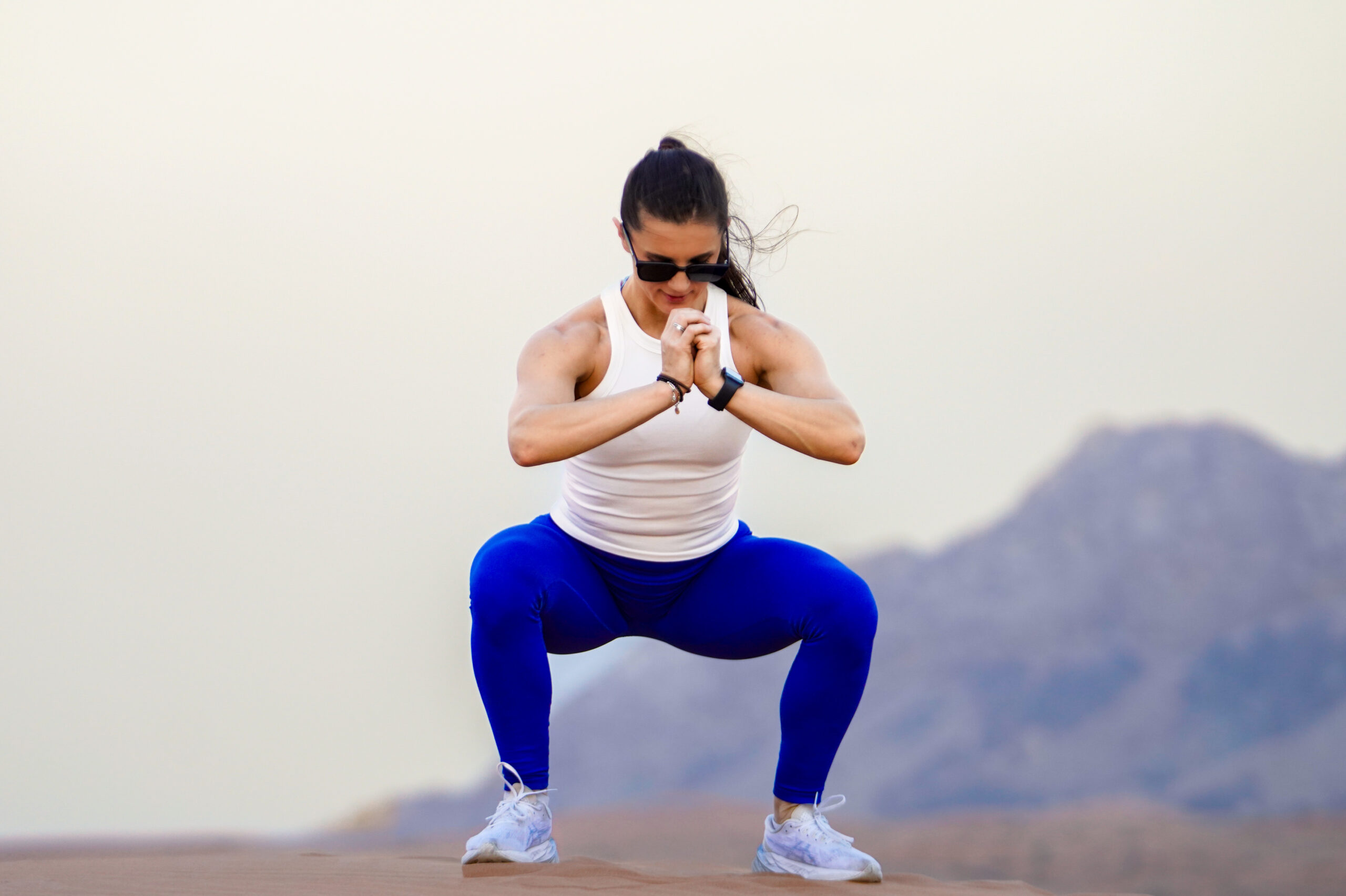 Women's wearing White Tank Top - Pathfinder Fitness